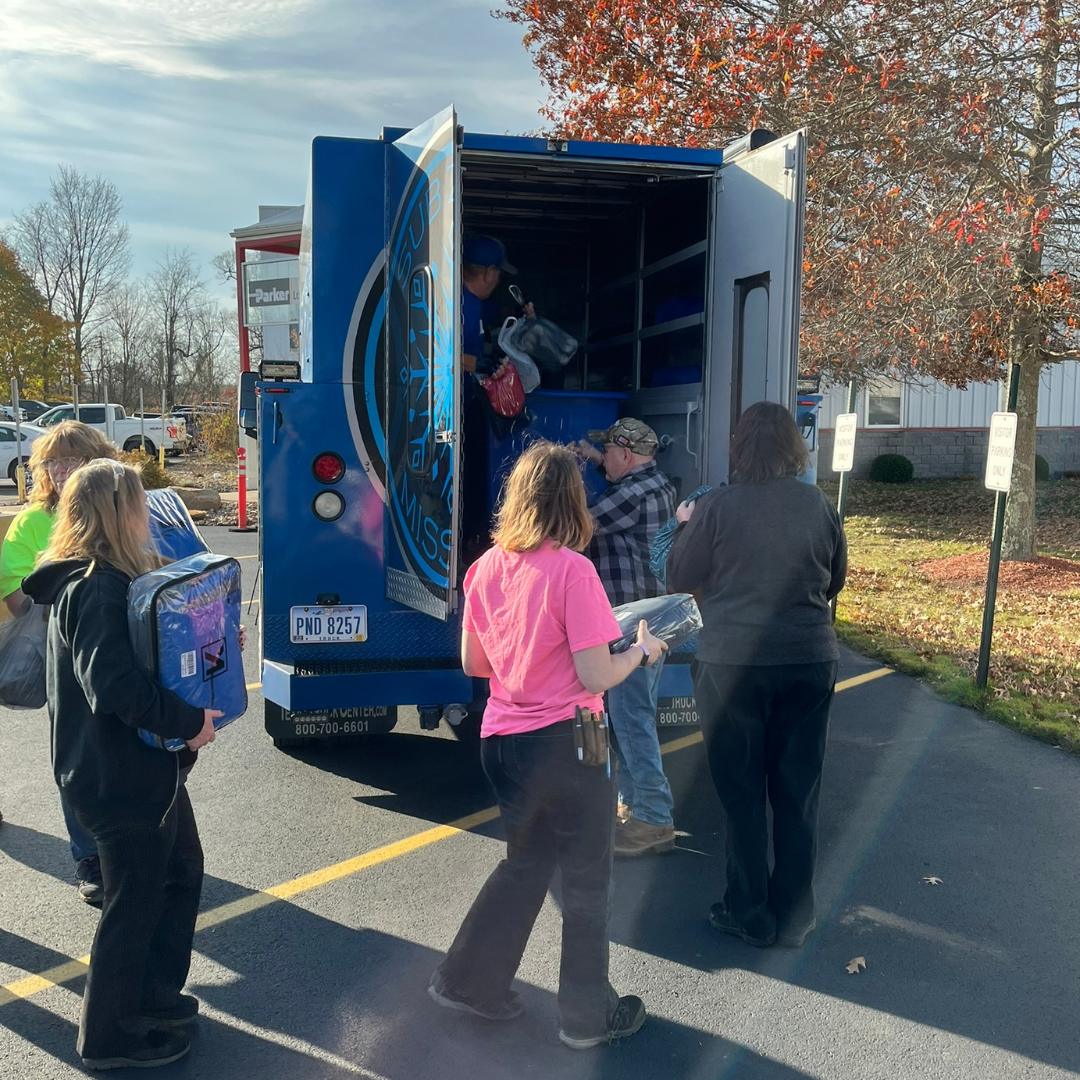 Loading1920 Volunteers loading the bus